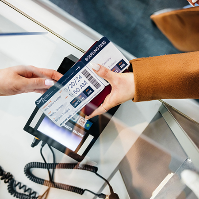 Handing airline ticket over
